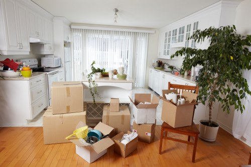 Large sofas and chairs prepared for safe storage in Sidcup