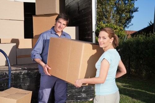 Organised apartment move with boxes and furniture ready for delivery in Sidcup